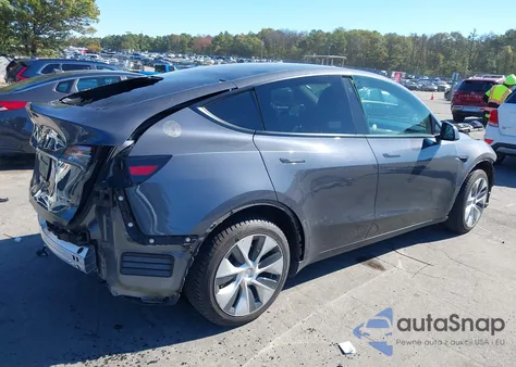 2022 Tesla Model Y Long Range Dual Motor All-Wheel Drive z USA, uszkodzony, nr VIN 7SAYGDEE1NF438239